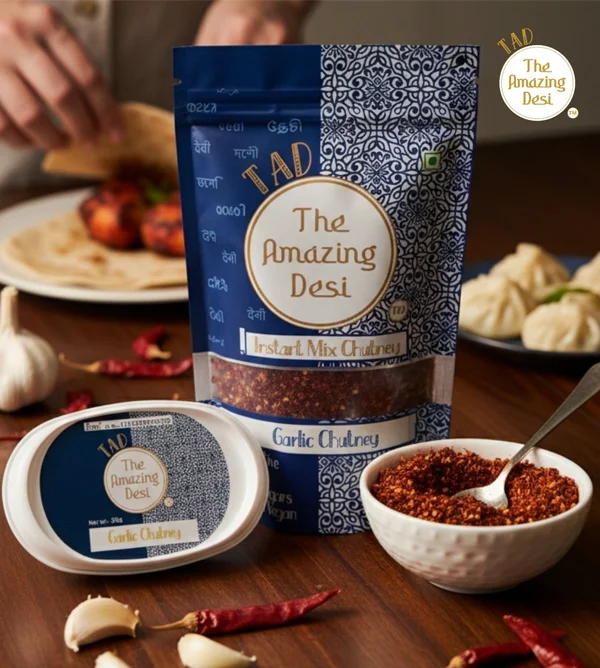 TAD The Amazing Desi instant garlic chutney powder packet and bowl on a wooden table.