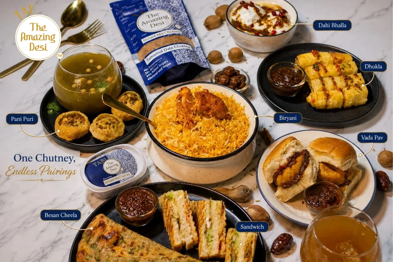 A wide spread of Indian street food including pani puri, vada pav, dhokla, and dahi bhalla paired with versatile TAD tamarind date chutney.